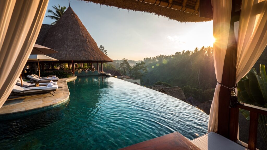 Luxury villa infinity pool overlooking lush jungle valley in Ubud, Bali